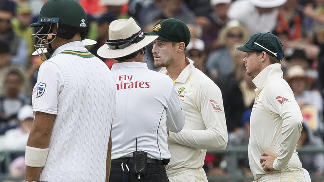 Cameron Bancroft and Steve Smith talk to the umpires during the infamous Cape Town Test in 2018 Picture: AP