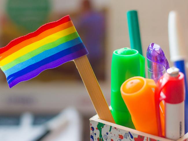 rainbow flag on a desk