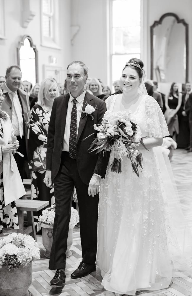 Olivia Catanach arrives at her wedding to Kyle Wilkinson with her father Nigel Fish. Picture: Tony Evans Photography