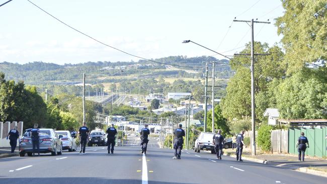 Police search Mort Street following a fatal shooting on February 26, 2025.