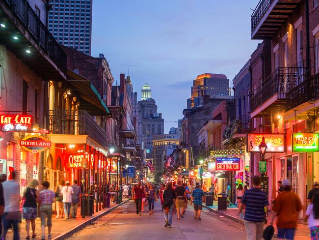 The French Quarter lit up at night.