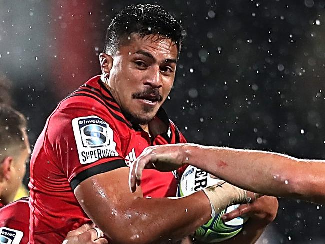 CHRISTCHURCH, NEW ZEALAND - MAY 25: Pete Samu (C) of the Crusaders makes a break during the round 15 Super Rugby match between the Crusaders and the Hurricanes at AMI Stadium on May 25, 2018 in Christchurch, New Zealand.  (Photo by Martin Hunter/Getty Images)