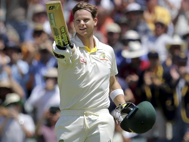 Australia's Steve Smith celebrates after scoring a century during the third day of their Ashes cricket test match against England in Perth, Australia, Saturday, Dec. 16, 2017. (AP Photo/Trevor Collens)