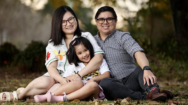 7-year-old Vivian Vo with her mother Phuong Ly and father Tien Vo. Picture: Tara Croser.