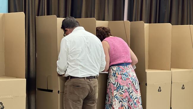 Solomon MP Luke Gosling and wife Kate vote at Parap Primary School on May 3, 2025. Picture: Fia Walsh