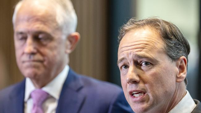 Minister for Health Greg Hunt speaks to the media alongside Prime Minister Malcolm Turnbull following a tour of the Peter McCallum Cancer Centre in Melbourne, Monday, July 16, 2018. (AAP Image/Daniel Pockett) NO ARCHIVING