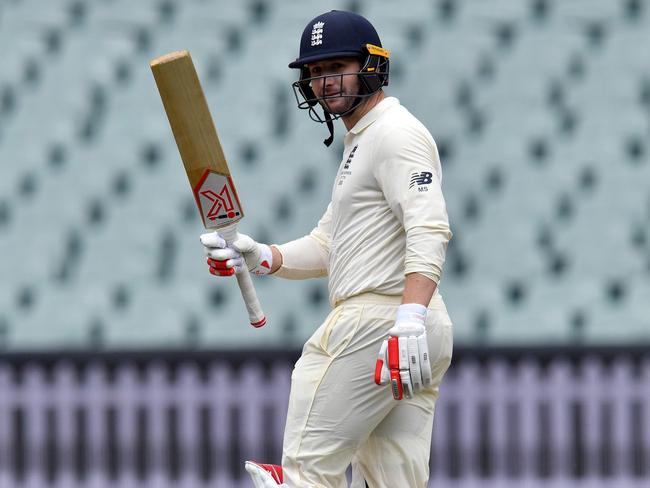 Mark Stoneman celebrates a half century against the CA XI.