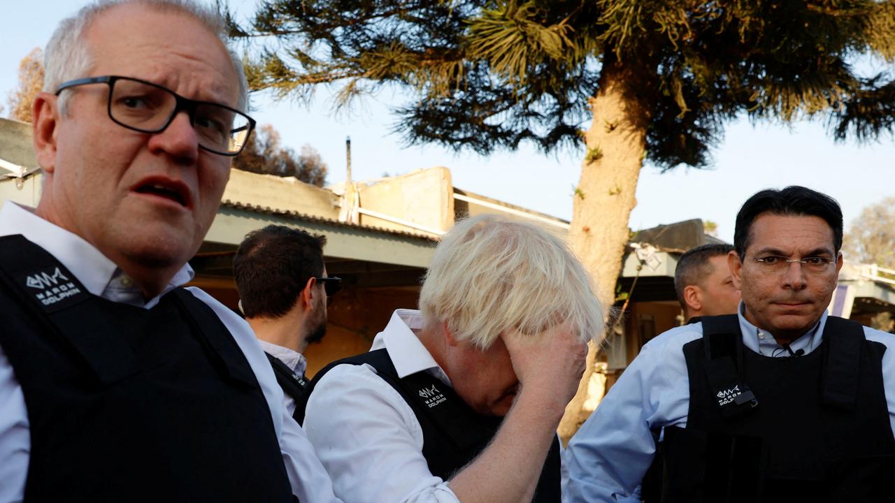 Scott Morrison and Boris Johnson witnessed ‘horrific’ scenes. Picture: Reuters/Evelyn Hockstein