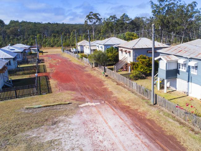 Aerial view over the houses of Allies Creek, 76 km south of Mundubbera, built for the  workers at the sawmill which closed in 2008. The whole town is now up for sale for $500,000. Photo Lachie Millard