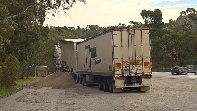 The truck buried in the pile of gravel. Picture: 7 News Adelaide