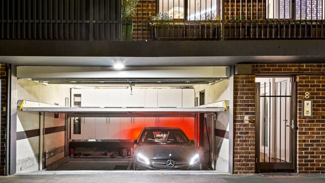 A secret extra garage below the floor is pretty James Bond.