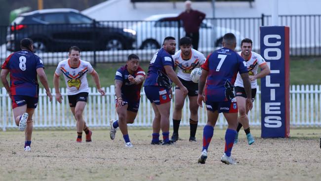 Campbelltown Collegians hooker Alefelio Moata'ane passes to Netane Masima. Picture: Steve Montgomery