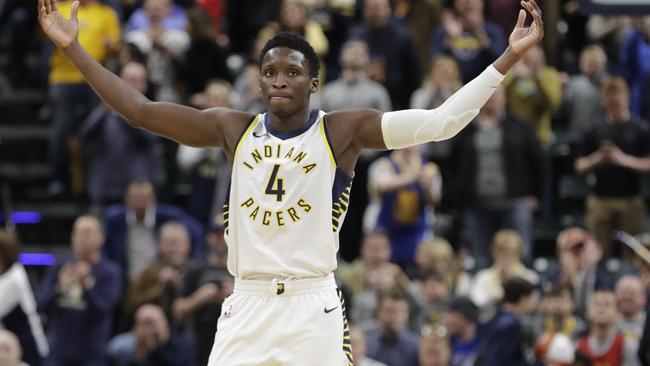 Indiana Pacers' Victor Oladipo celebrates during overtime.