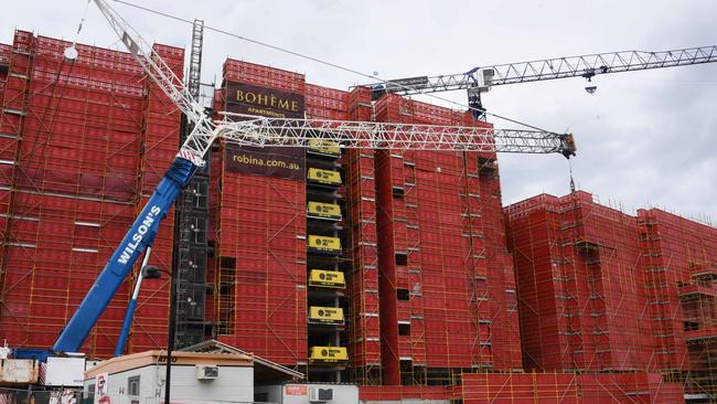 Cranes remain but no workers at the Boheme Apartments at Robina. Photo: Steve Holland