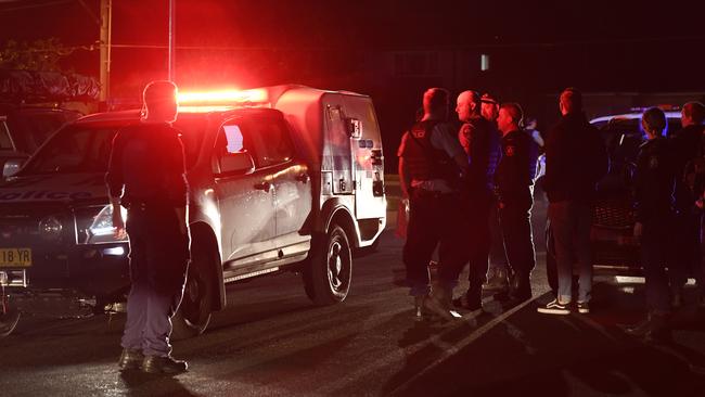 Police at the scene of an incident in Warriewood which saw a police officer allegedly injured by youths in June last year. Picture: Gordon McComiskie