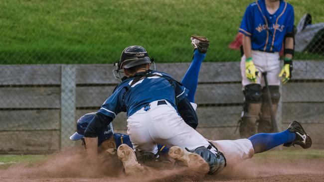 Geelong catcher Tanner Stack applies a tag at home plate against Williamstown. Picture: Jackson Geall.