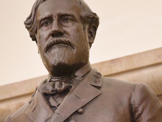 A statue of Confederate commanding general Robert E. Lee is seen in the crypt of the US Capitol in Washington, DC on August 24, 2017. With moves to dismantle Confederate monuments gaining momentum, Nancy Pelosi, the Democratic leader in the House of Representatives, recently called for Confederate statues to be removed from the US Capitol. / AFP PHOTO / MANDEL NGAN