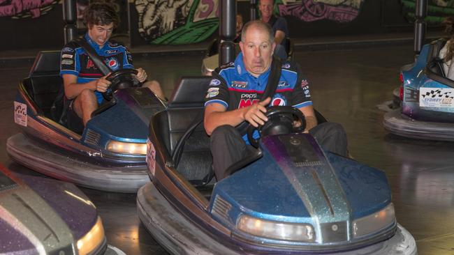 Paul Morris and Chaz Mostert celebrated with a spin in the dodgems at Luna Park yesterday.