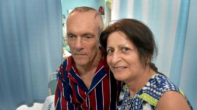 Former Coolum man Steve Nichol is recovering in a Brisbane hospital after a brain operation. Steve is comforted by his wife Angie. Picture: Warren Lynam