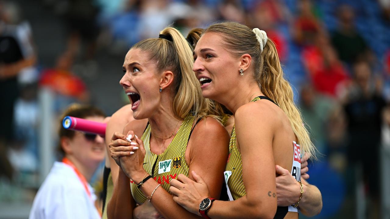 ROME, ITALY - JUNE 11: Alica Schmidt and Luna Bulmahn of Team Germany react following the Women's 4x400m Heats on day five of the 26th European Athletics Championships - Rome 2024 at Stadio Olimpico on June 11, 2024 in Rome, Italy. (Photo by Mattia Ozbot/Getty Images for European Athletics)