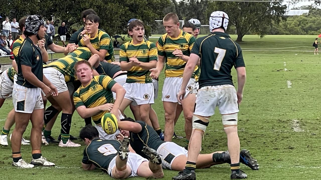 Cohen Taylor, right, celebrating a Manaaki Bateman try in round 2.