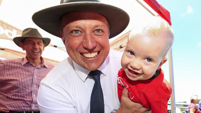 Premier Steven Miles visits pre-polling at Mackay Showgrounds and meets Viv Clerc, 10 months. Picture: Adam Head