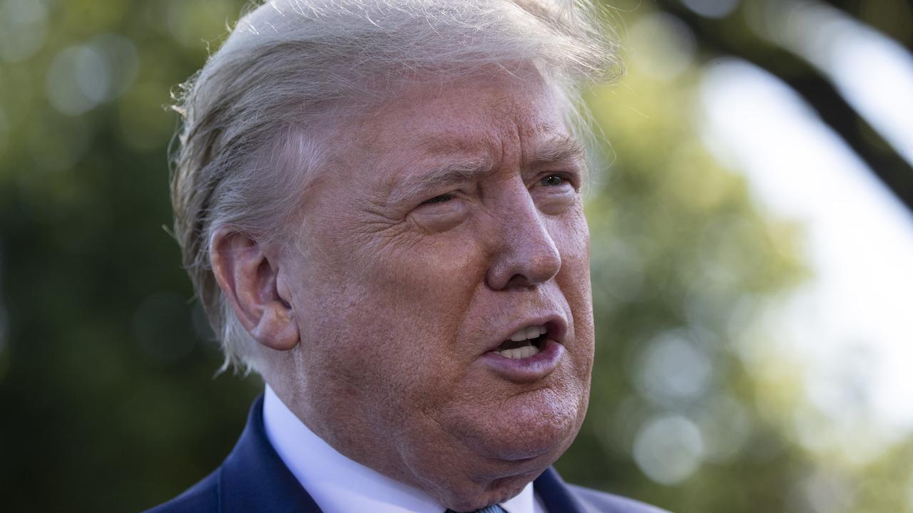 President Donald Trump speaks with reporters on Friday, May 15, even though everyone who attended used the Abbott test, which has since had doubt cast on it. Picture: Alex Brandon/AP