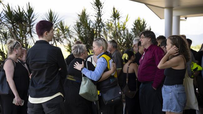 Friends and family of stabbing victim Declan Laverty are pictured dressed in black and yellow in honour of Declan’s favourite AFL team, the Richmond Tigers, as they attend his funeral memorial service in Cairns. Picture: NCA NewsWire / Emily Barker