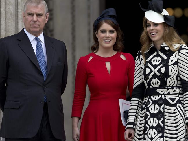 (FILES) This file photo taken on June 10, 2016 shows Britain's Prince Andrew, Duke of York (L), Britain's Princess Eugenie of York (C), Britain's Princess Beatrice of York (R) leave after attending a national service of thanksgiving for the 90th birthday of Britain's Queen Elizabeth II at St Paul's Cathedral in London on June 10, 2016, which is also the Duke of Edinburgh's 95th birthday.  Princess Eugenie, a granddaughter of Britain's Queen Elizabeth II and daughter of Britain's Prince Andrew, Duke of York, is to marry her long-term boyfriend Jack Brooksbank at the same wedding venue as Prince Harry and Meghan Markle in the Autumn of 2018, Buckingham Palace announced on January 22, 2018. / AFP PHOTO / JUSTIN TALLIS