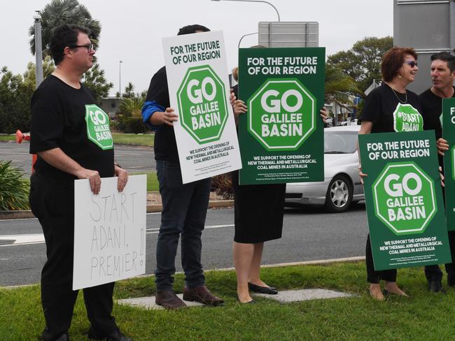 Federal Member for Dawson George Christensen (left) leads a pro-Adani rally as Premier Annastacia Palaszczuk visits Mackay.