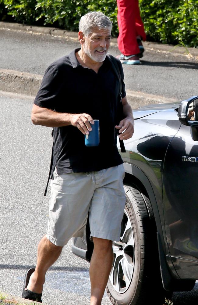 George Clooney headed to Sanctuary Cove on the Gold Coast after leaving the pool. Picture: Steve Pohlner