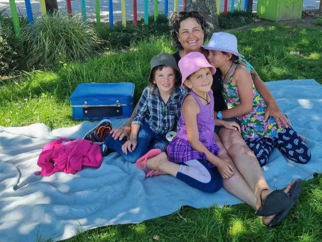 Missing kids Jayda, 11, Maverick, 9, and Ember, 8, taken by their father Tom Phillips, have been spotted for the first time since 2021. Pictured: With mum Cat before they went missing. Picture: Facebook