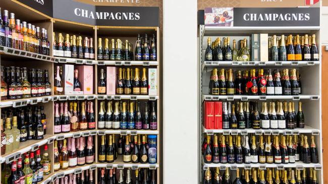 Spolied for choice for champagne in supermarket in France.