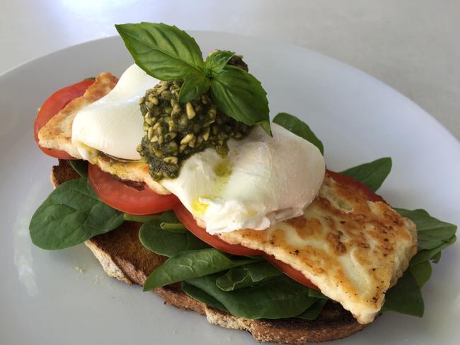 Breakfast bruschetta with two poached eggs. Picture: Jenifer Jagielski