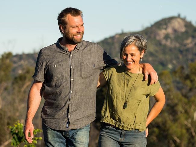 Dan Williamson and his partner Mel Pickering pictured on their property in Yowrie near Cobargo on New Year's Eve 2021. Picture: Ben Marden / The Australian