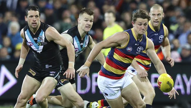 Five Adelaide and Port Adelaide matches played interstate will be shown live on pay TV only. Picture: Sarah Reed