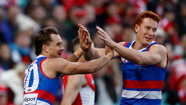 SYDNEY, AUSTRALIA – JULY 28: Lachlan McNeil (left) and Ed Richards of the Bulldogs celebrate during the 2024 AFL Round 20 match between the Sydney Swans and the Western Bulldogs at The Sydney Cricket Ground on July 28, 2024 in Sydney, Australia. (Photo by Michael Willson/AFL Photos via Getty Images)