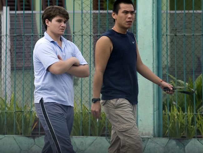 Scott Rush and Si Yi Chen walking inside Kerobokan jail in 2010.