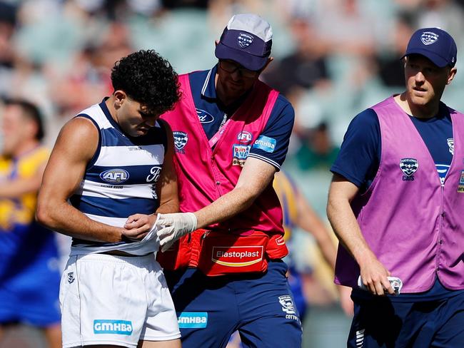 Tyson Stengle injures his left wrist. Picture: Dylan Burns/AFL Photos via Getty Images