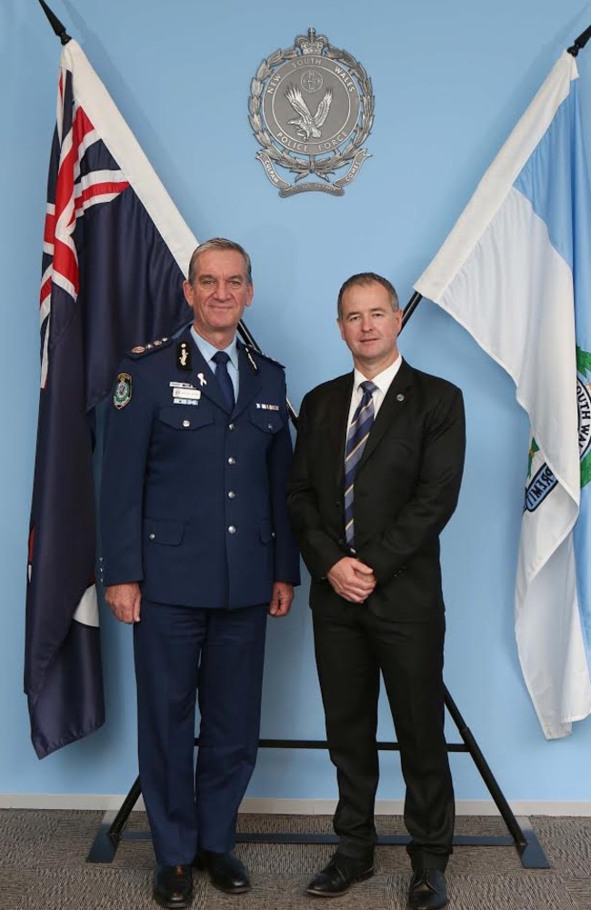 Det Supt Willing with former commissioner Andrew Scipione.