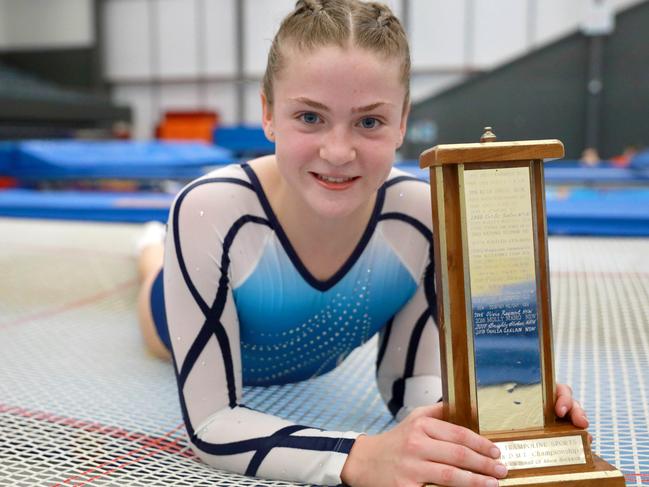 Tahlia bounces to the top of trampoline gymnastics