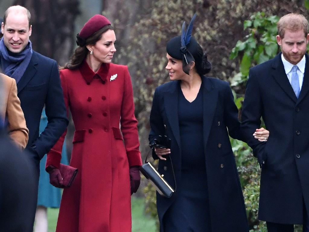 While Meghan and Kate chatted animatedly, Harry and Wills didn’t make eye contact. Picture: Paul Ellis/AFP