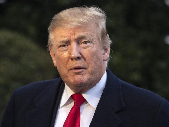 US President Donald Trump returns to the White House on March 24, 2019 in Washington, DC after spending the weekend in Florida. - Trump declared he had been completely exonerated after his campaign was cleared of colluding with Russia in the 2016 election campaign. (Photo by Eric BARADAT / AFP)
