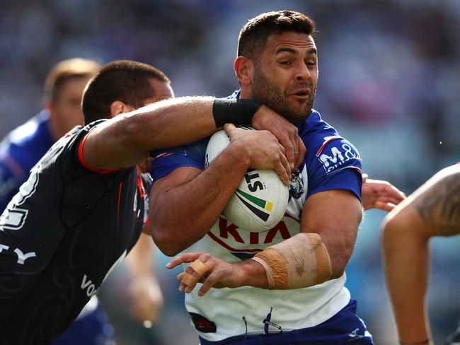 SYDNEY, AUSTRALIA - AUGUST 19: Rhyse Martin of the Bulldogs is tackled during the round 23 NRL match between the Canterbury Bulldogs and the New Zealand Warriors at ANZ Stadium on August 19, 2018 in Sydney, Australia. (Photo by Mark Kolbe/Getty Images)