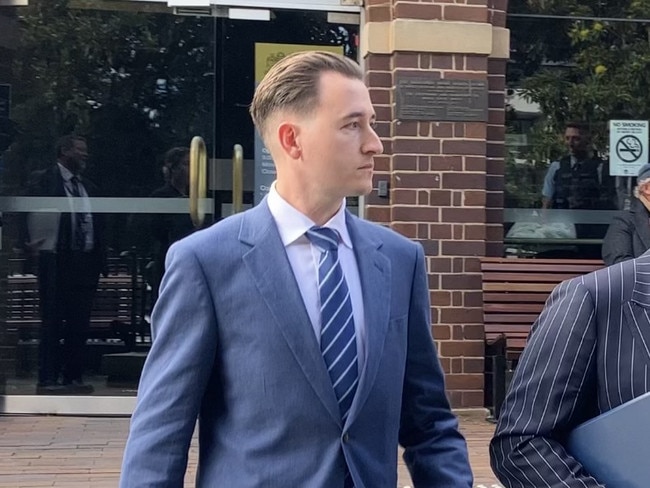 First appearance for Matthew Cameron (Blue Suit) outside Manly local Court for sexually touching another person without Consent.,