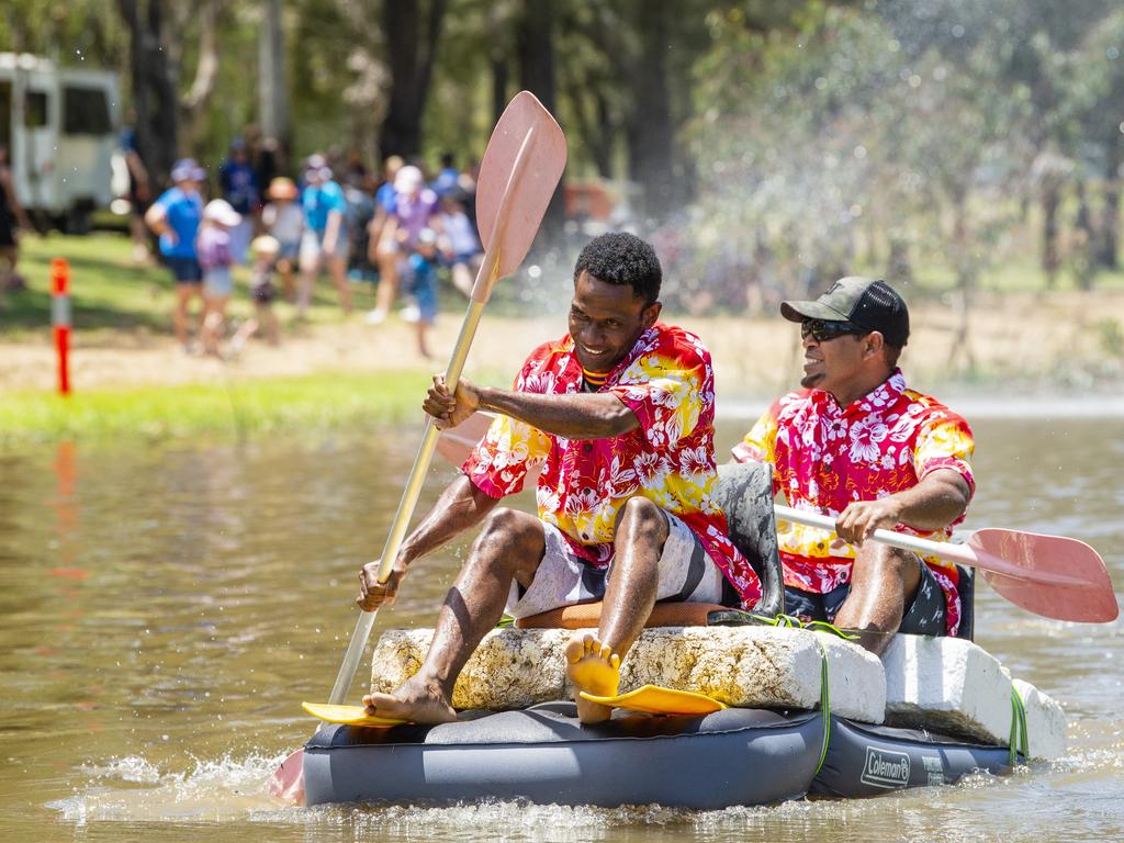 Raft race winners Moses Koruahuna (front) and Peter Afu power home at Oakey Australia Day celebrations in Arthur Shooter Park, Thursday, January 26, 2023. Picture: Kevin Farmer