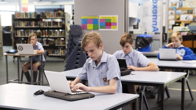 Redcliffe State High School students sitting 1.5m apart during COVID-19. PHOTO: AAP /Attila Csaszar