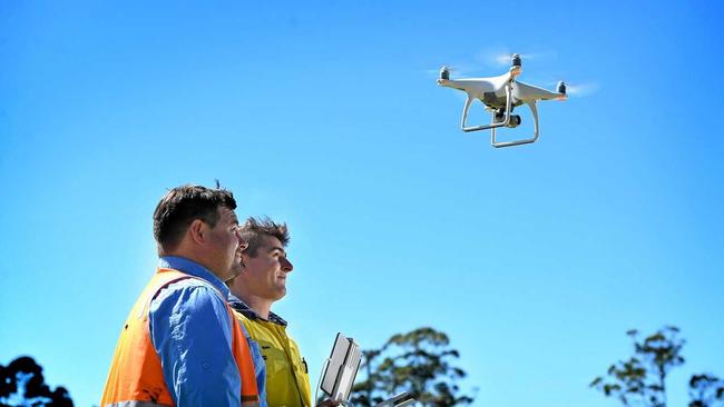 EYE IN THE SKY: Water and Waste Water inspector Joe Morrissey with plant operator Blake Brewer-Charles and the new Lismore City Council drone to be used to inspect wastewater trunk mains and overflow. Picture: Marc Stapelberg