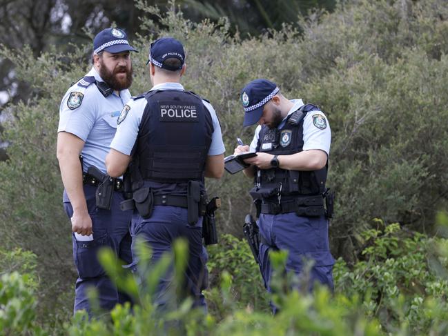 DECEMBER 9, 2024: Police pictured at a crime scene on Foreshore Road in Botany where a Body wrapped in plastic was found.A major police investigation is underway after a body was found dumped and wrapped in plastic in bushland near Sydney Airport.Picture: Damian Shaw