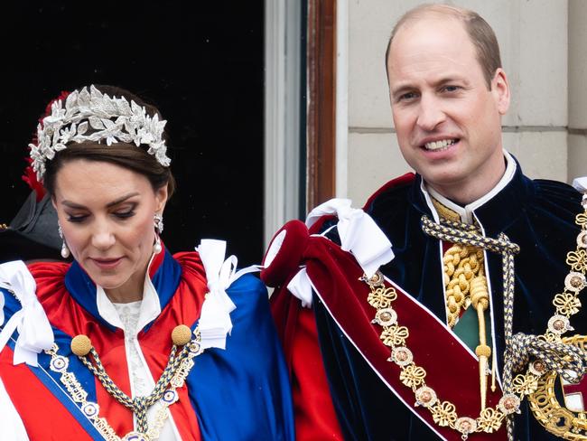 LONDON, ENGLAND - MAY 06:  Catherine, Princess of Wales, Prince Louis of Wales, Prince William, Prince of Wales on the balcony of Buckingham Palace, London, following the coronation on May 06, 2023 in London, England. The Coronation of Charles III and his wife, Camilla, as King and Queen of the United Kingdom of Great Britain and Northern Ireland, and the other Commonwealth realms takes place at Westminster Abbey today. Charles acceded to the throne on 8 September 2022, upon the death of his mother, Elizabeth II.  (Photo by Samir Hussein/WireImage)